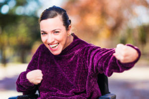 a woman with Cerebral Palsy smiling